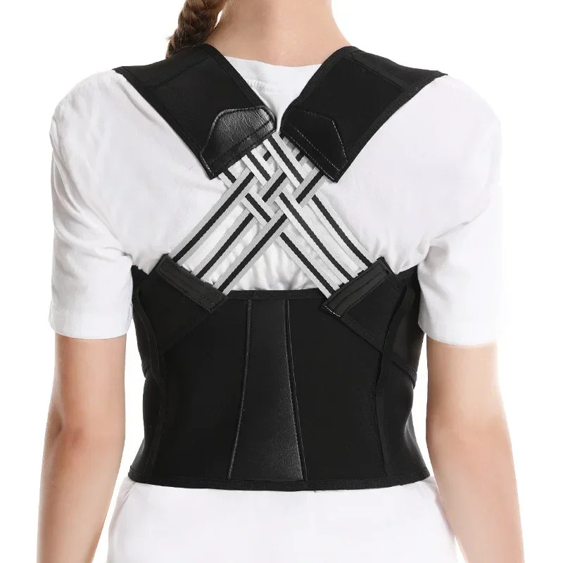 Black posture corrector worn by a person on a white background