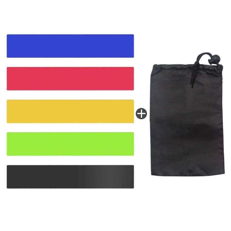 Set of colorful resistance bands with a black drawstring bag on a white background