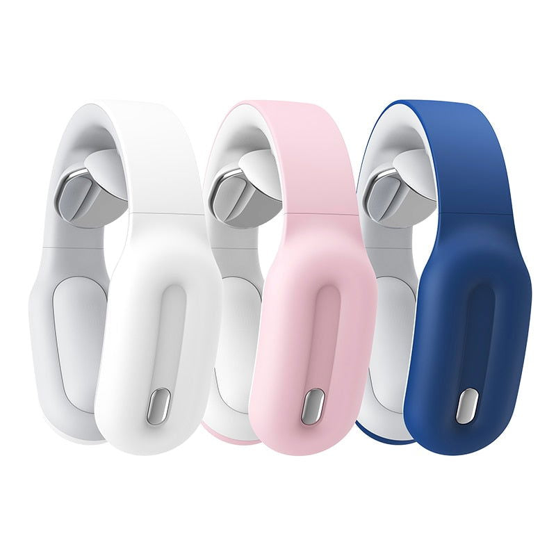 Three silicone bands in white, pink, and blue on a white background