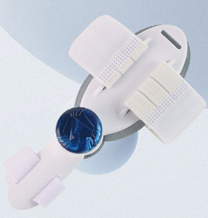 White electronic device with a blue circular component on a light blue background